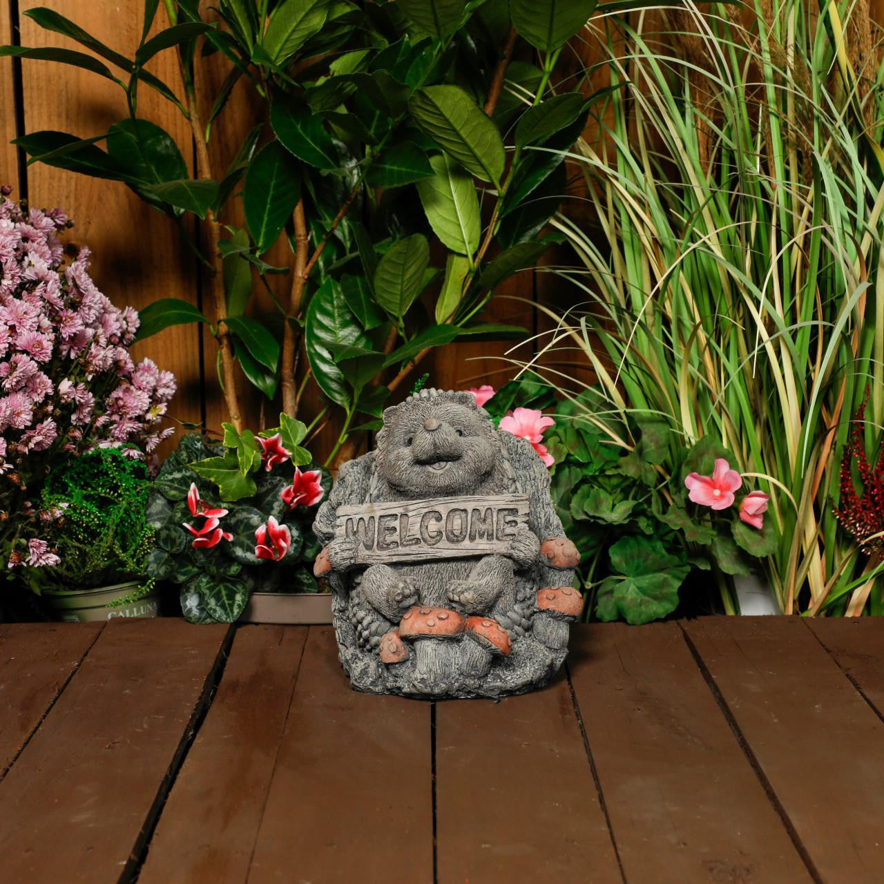 Cheerful Stone Cast Hedgehog with Welcome Sign