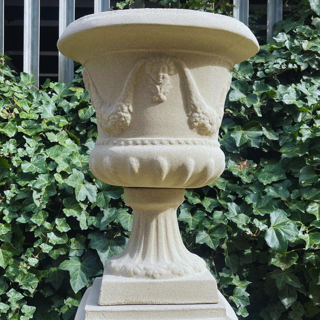 Large Sandstone Fluted Urn and Column with Laurel Wreaths