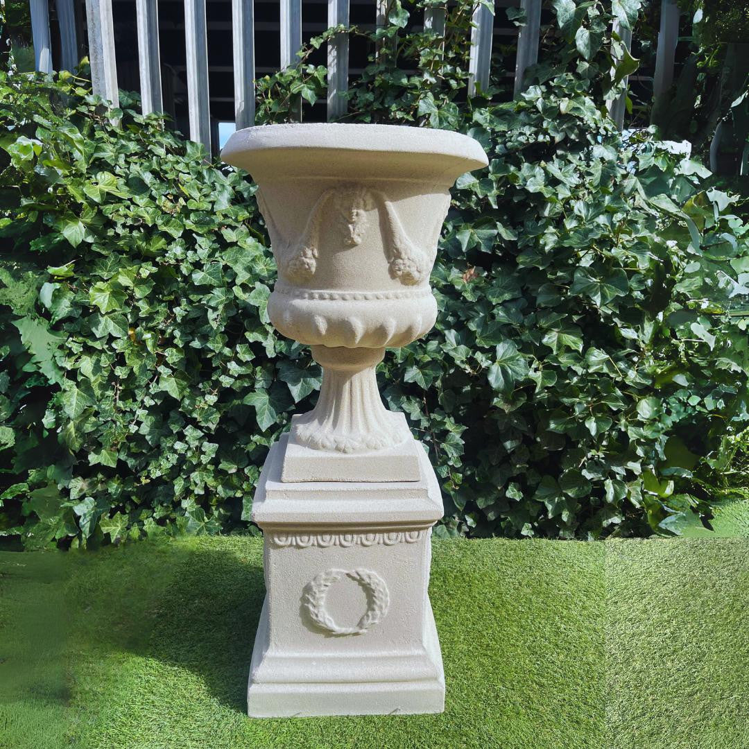 Large Sandstone Fluted Urn and Column with Laurel Wreaths
