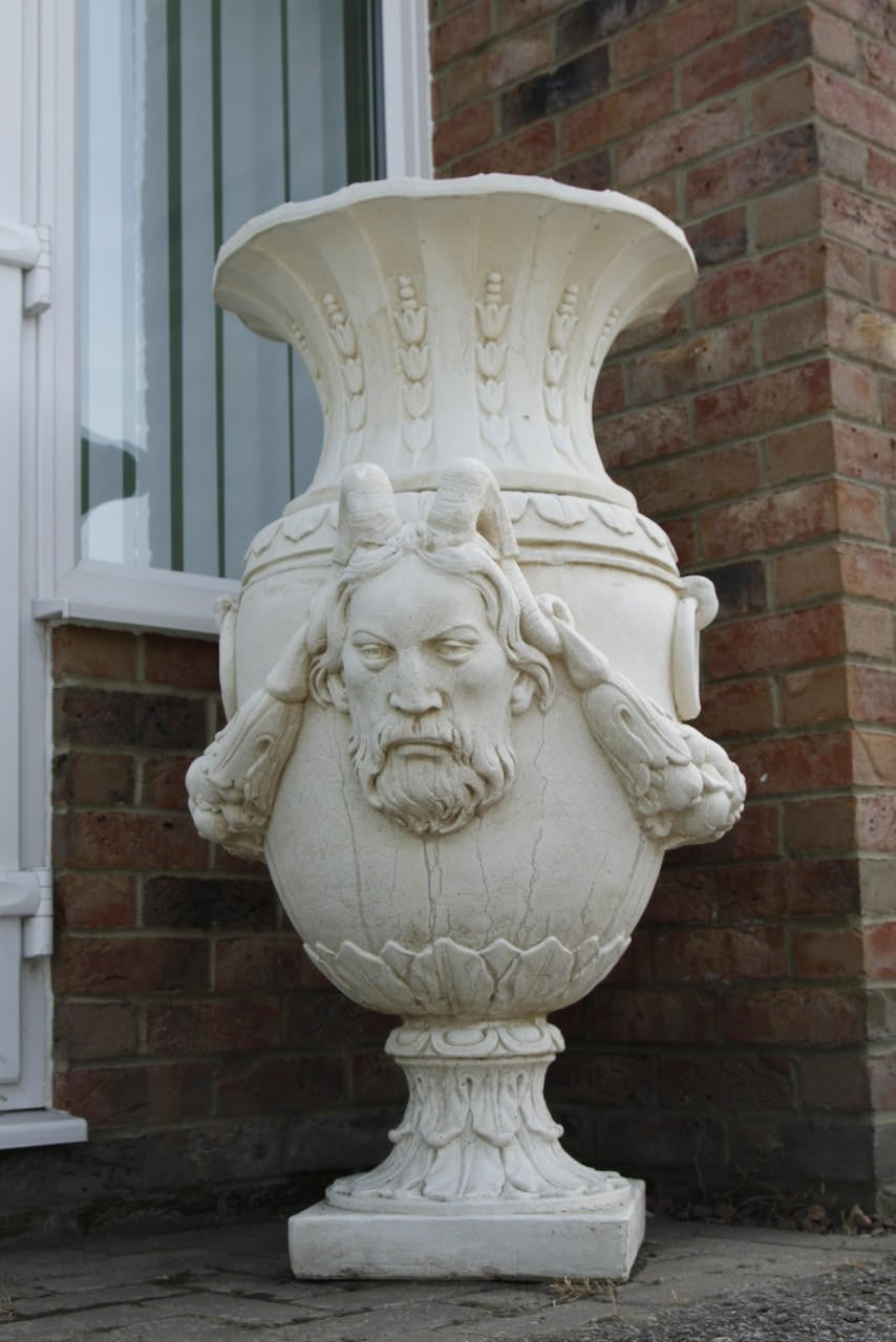 Pair of Urns With Mythical Horned Man Design