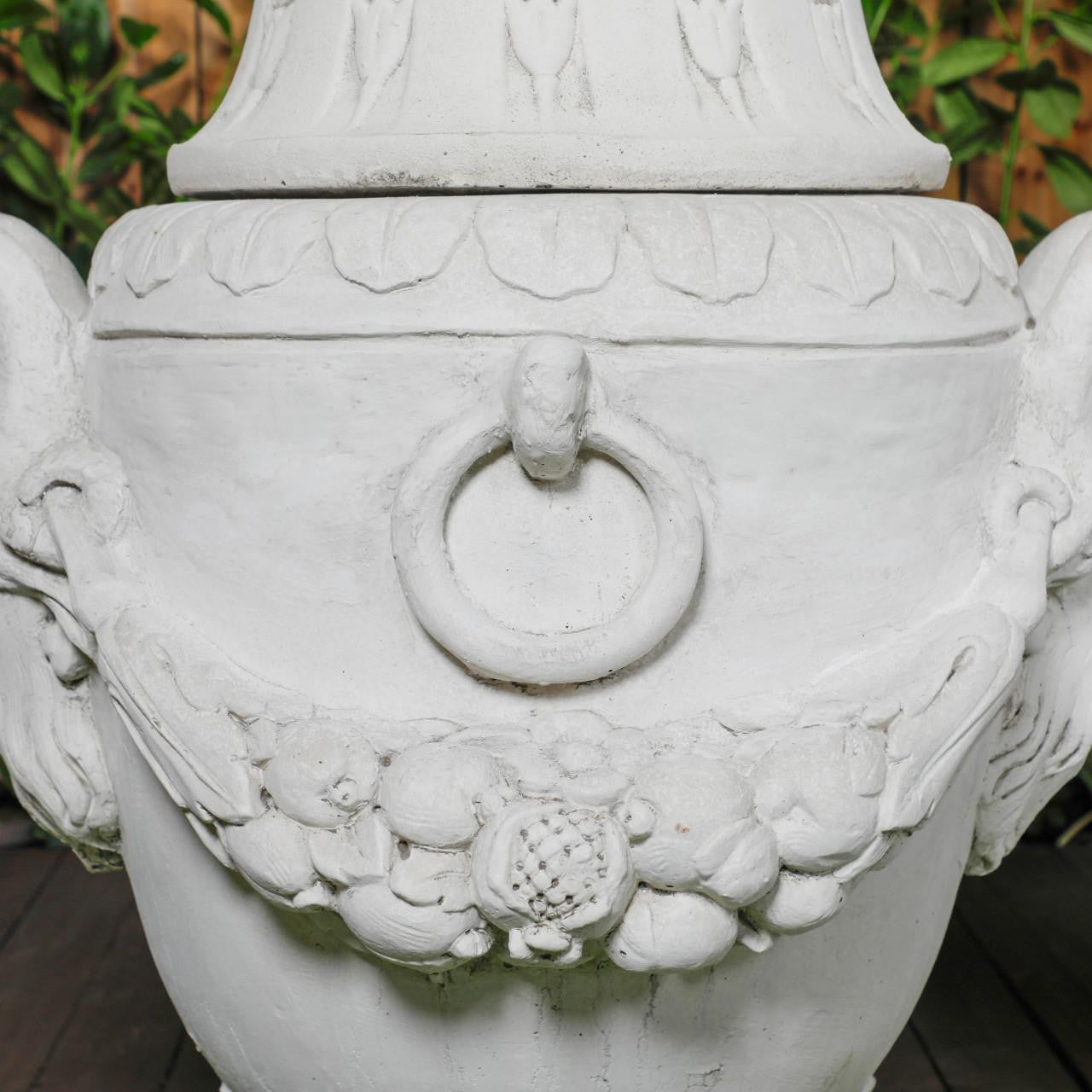 Pair of Urns With Mythical Horned Man Design