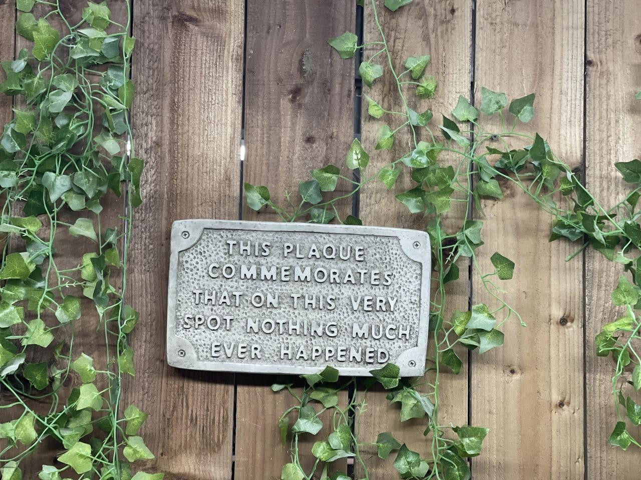 Stone cast Humorous Wall Sign Nothing happens in this spot