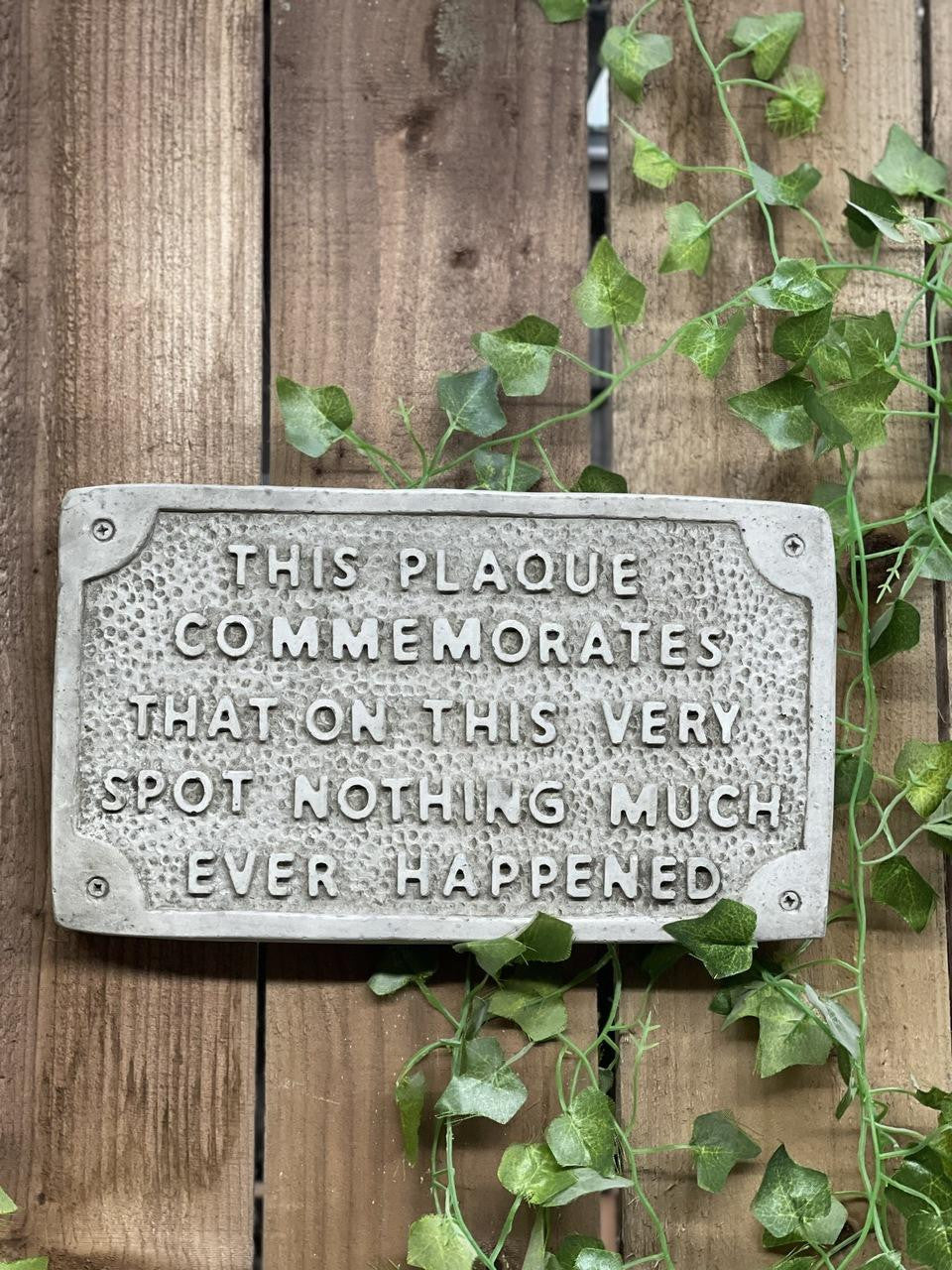 Stone cast Humorous Wall Sign Nothing happens in this spot