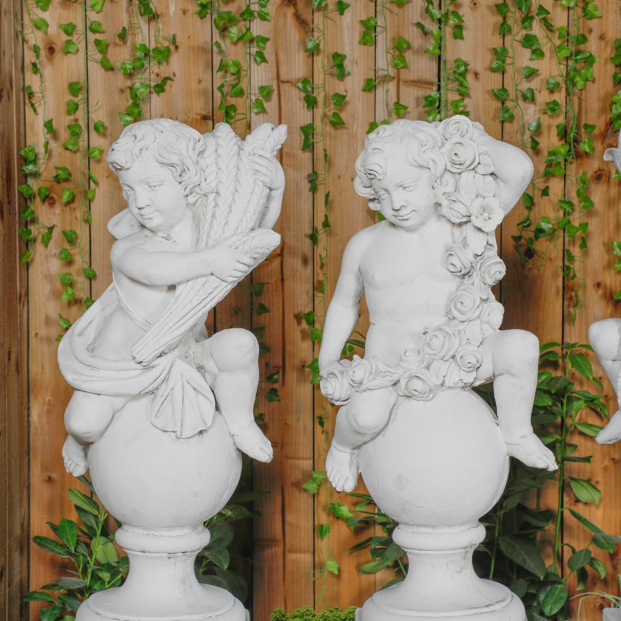 White Four Seasons Cherub Statues