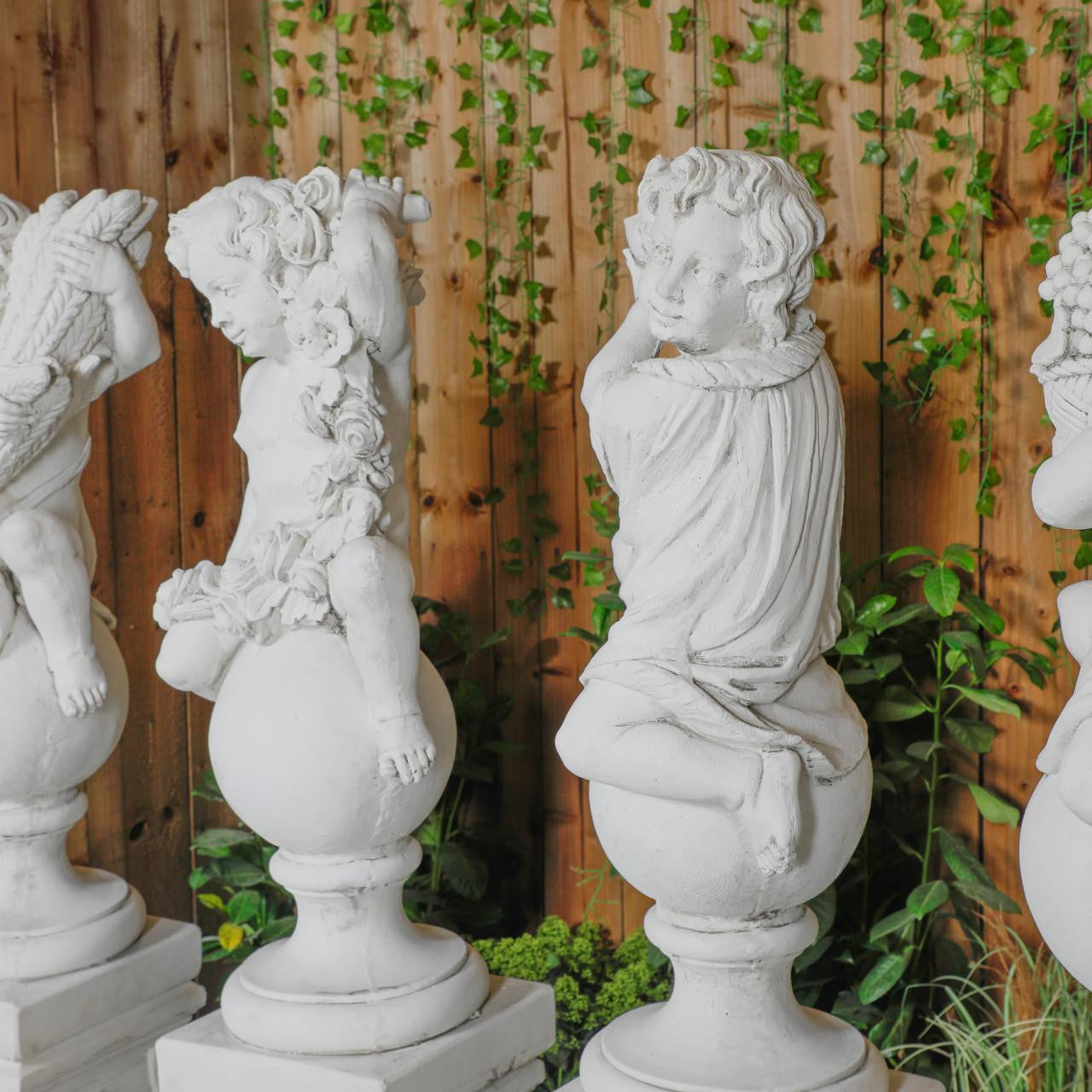 White Four Seasons Cherub Statues