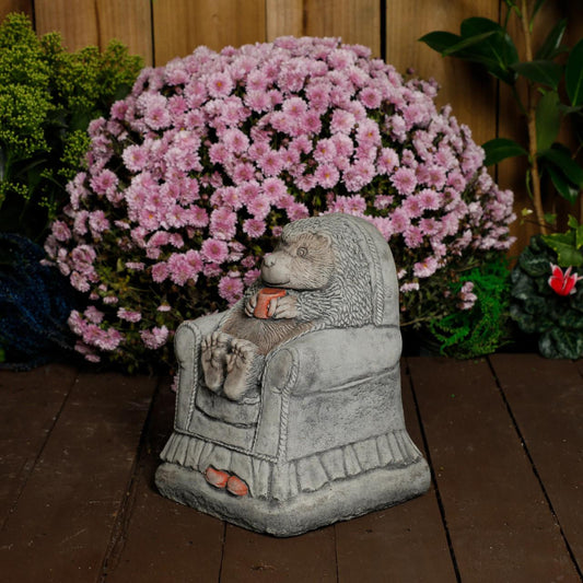 Adorable Hedgehog in chair garden ornament 