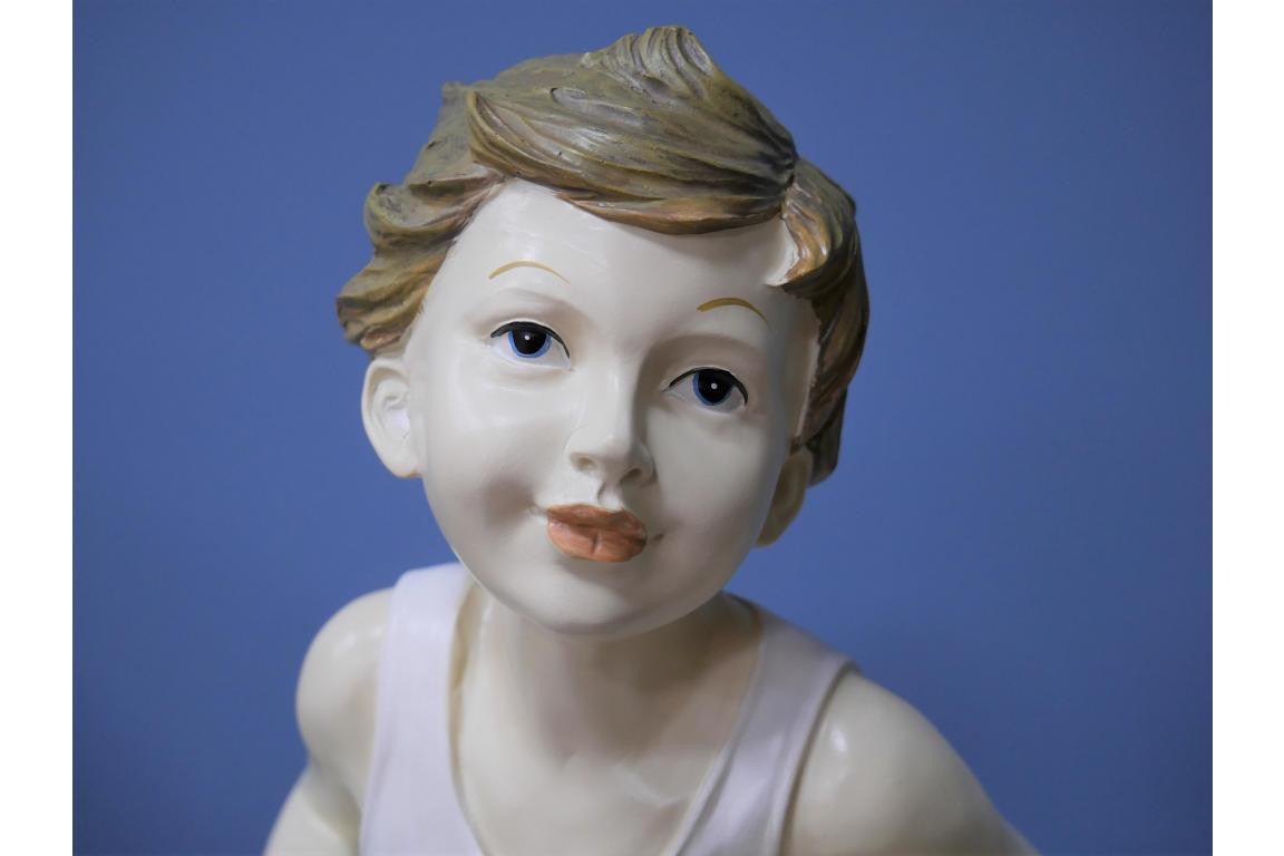 Boy on Scooter garden and home ornament