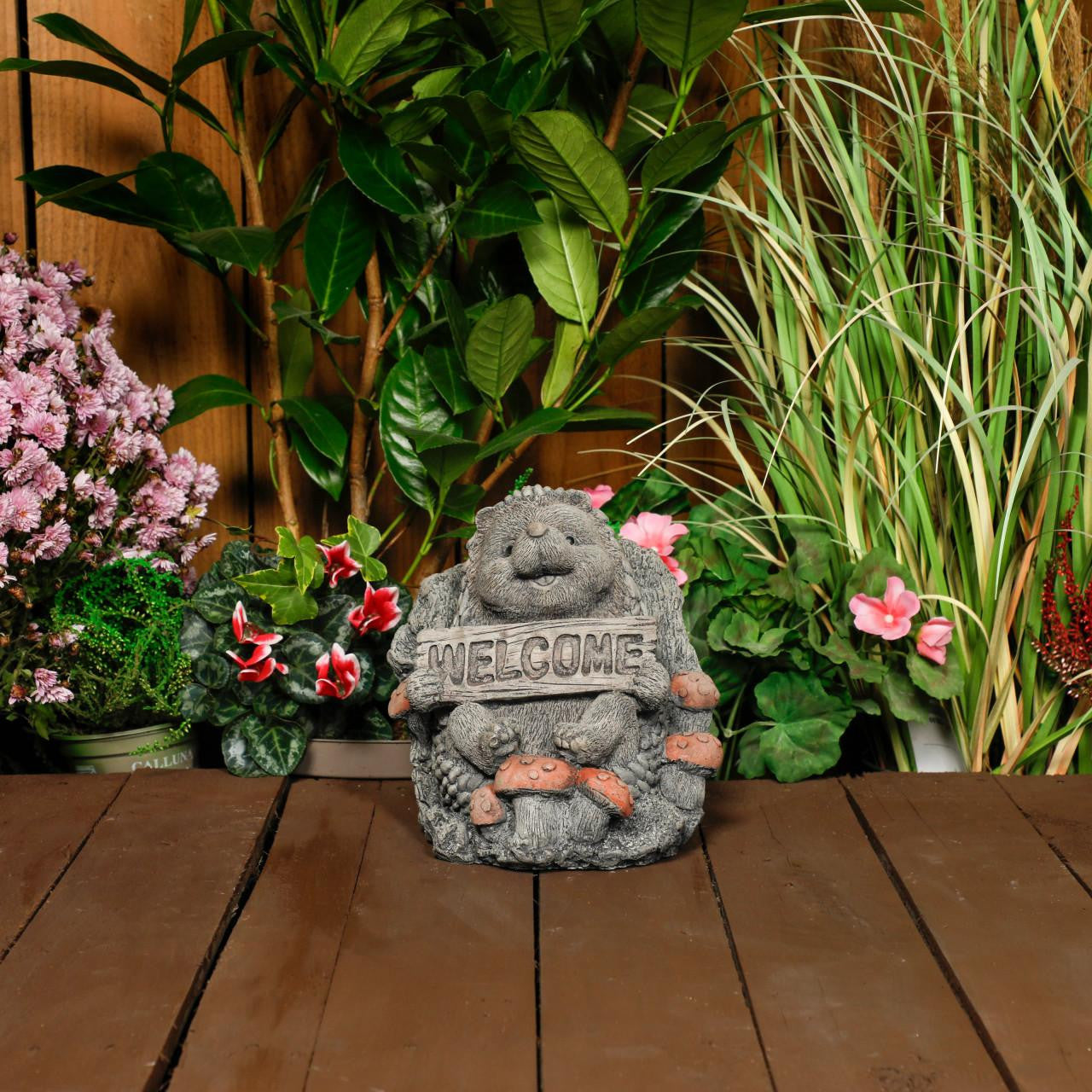 Cheerful Stone Cast Hedgehog with Welcome Sign
