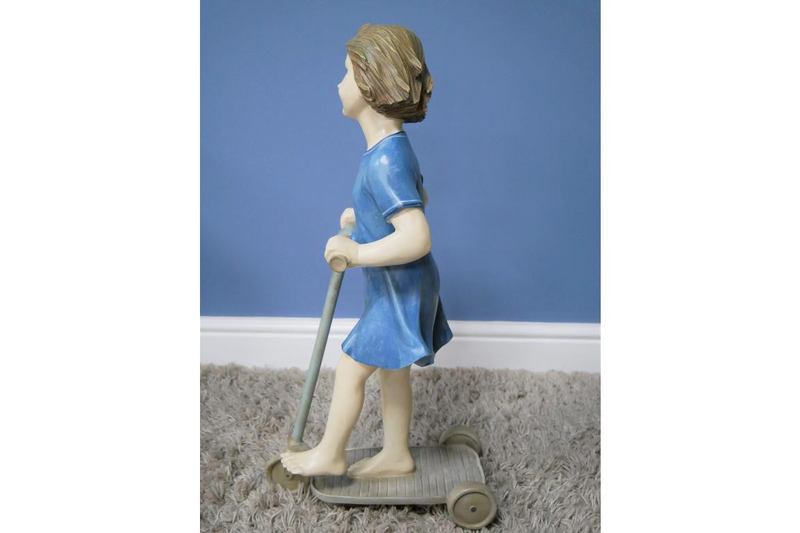 Girl on Scooter Garden and home ornament