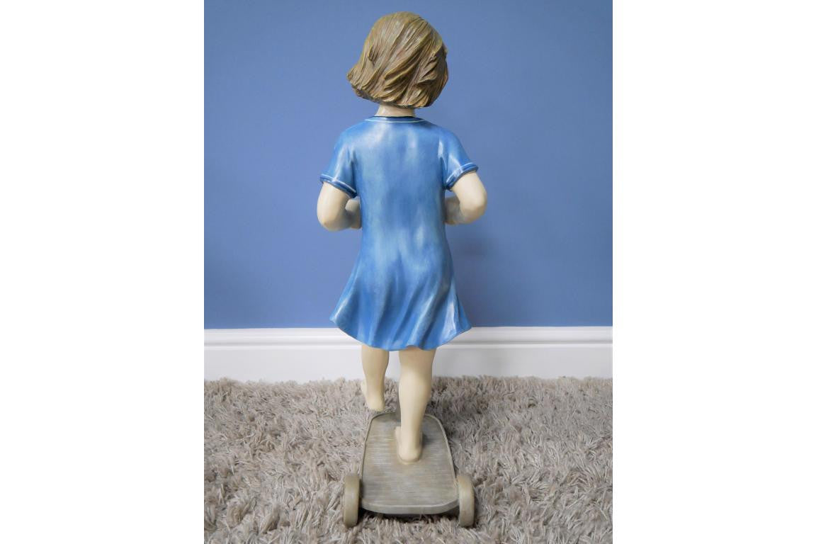 Girl on Scooter Garden and home ornament