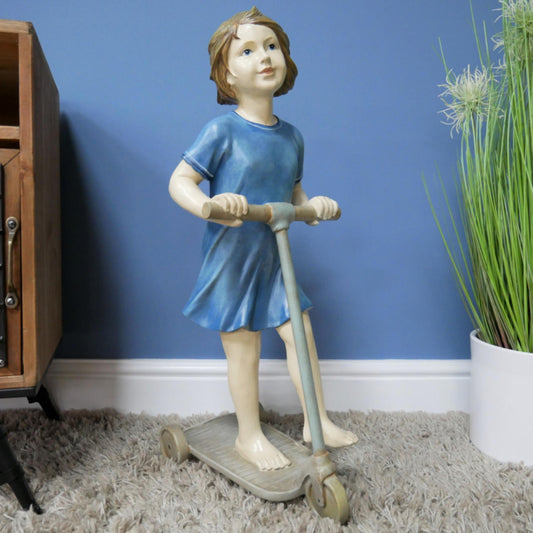 Girl on Scooter Garden and home ornament