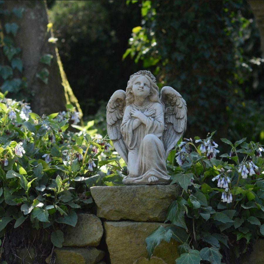 Kneeling Angel Girl with Arms Crossed