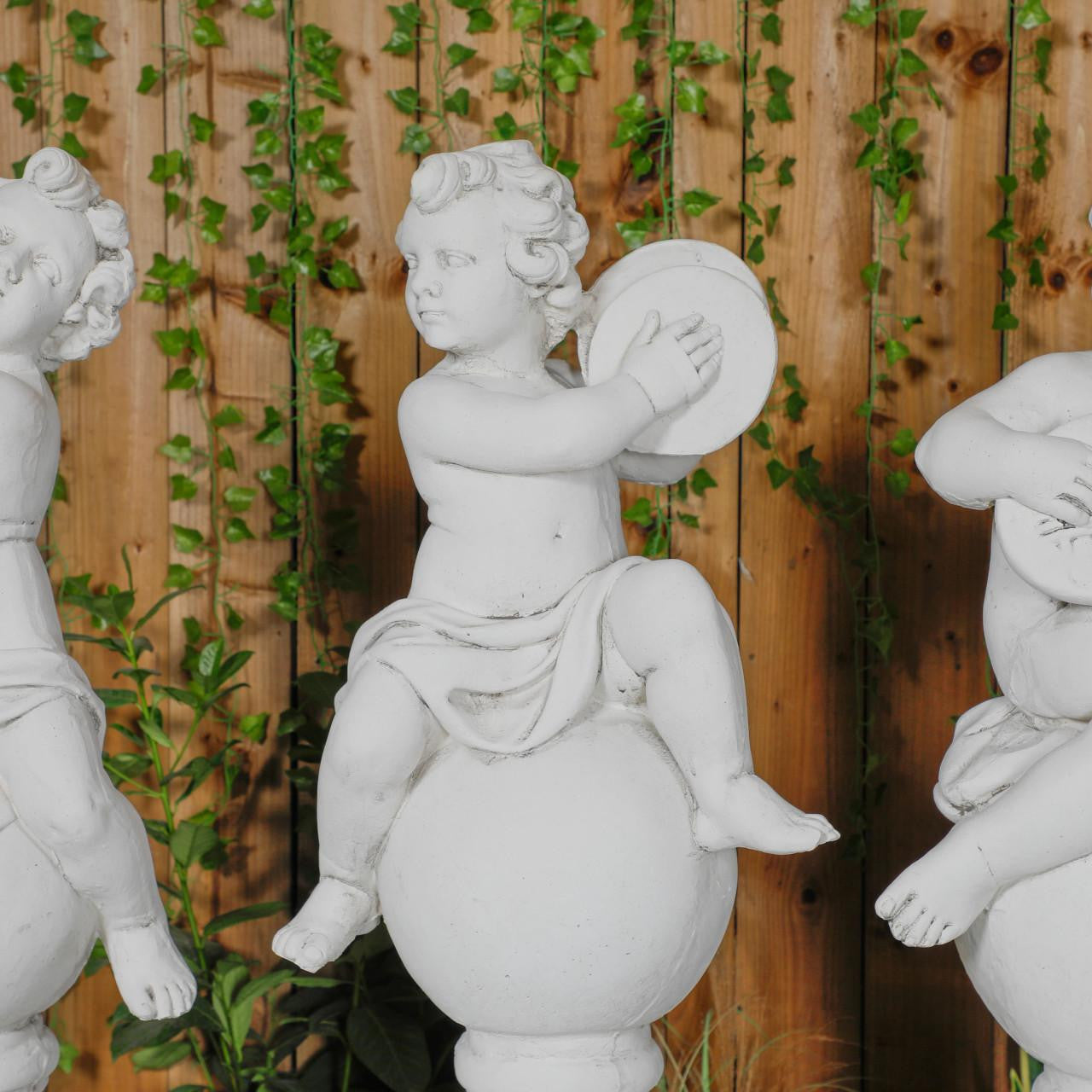 Four Musical Cherub Statues  