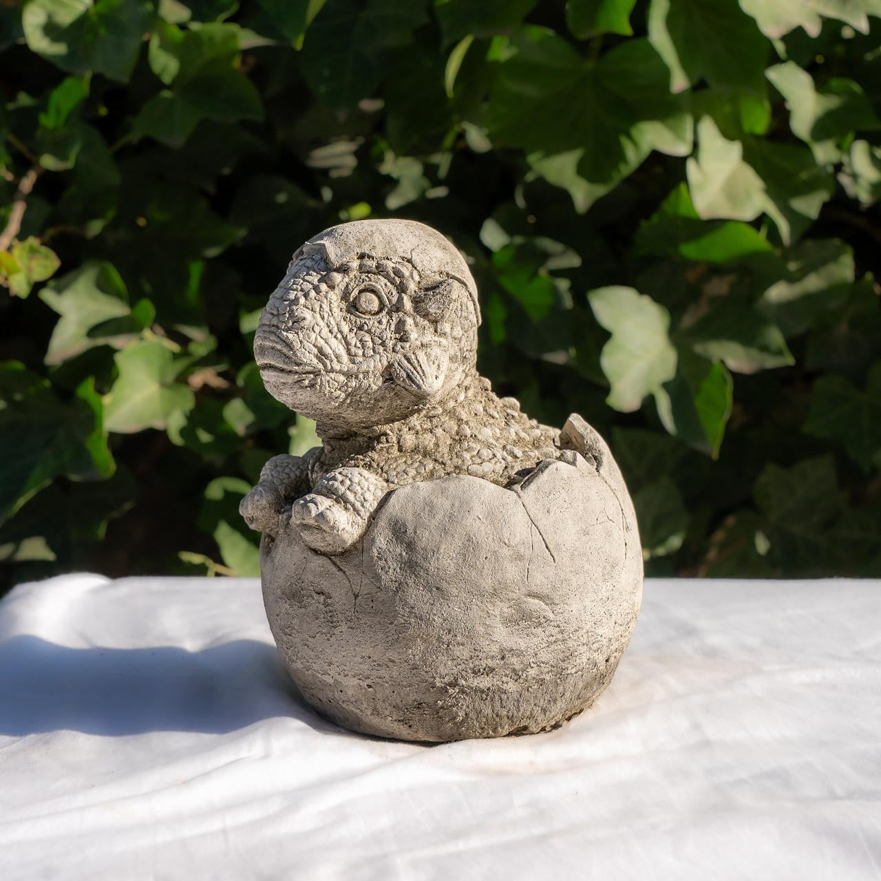 Small Stone Cast  Baby Dino with Eggshell Hat Statue
