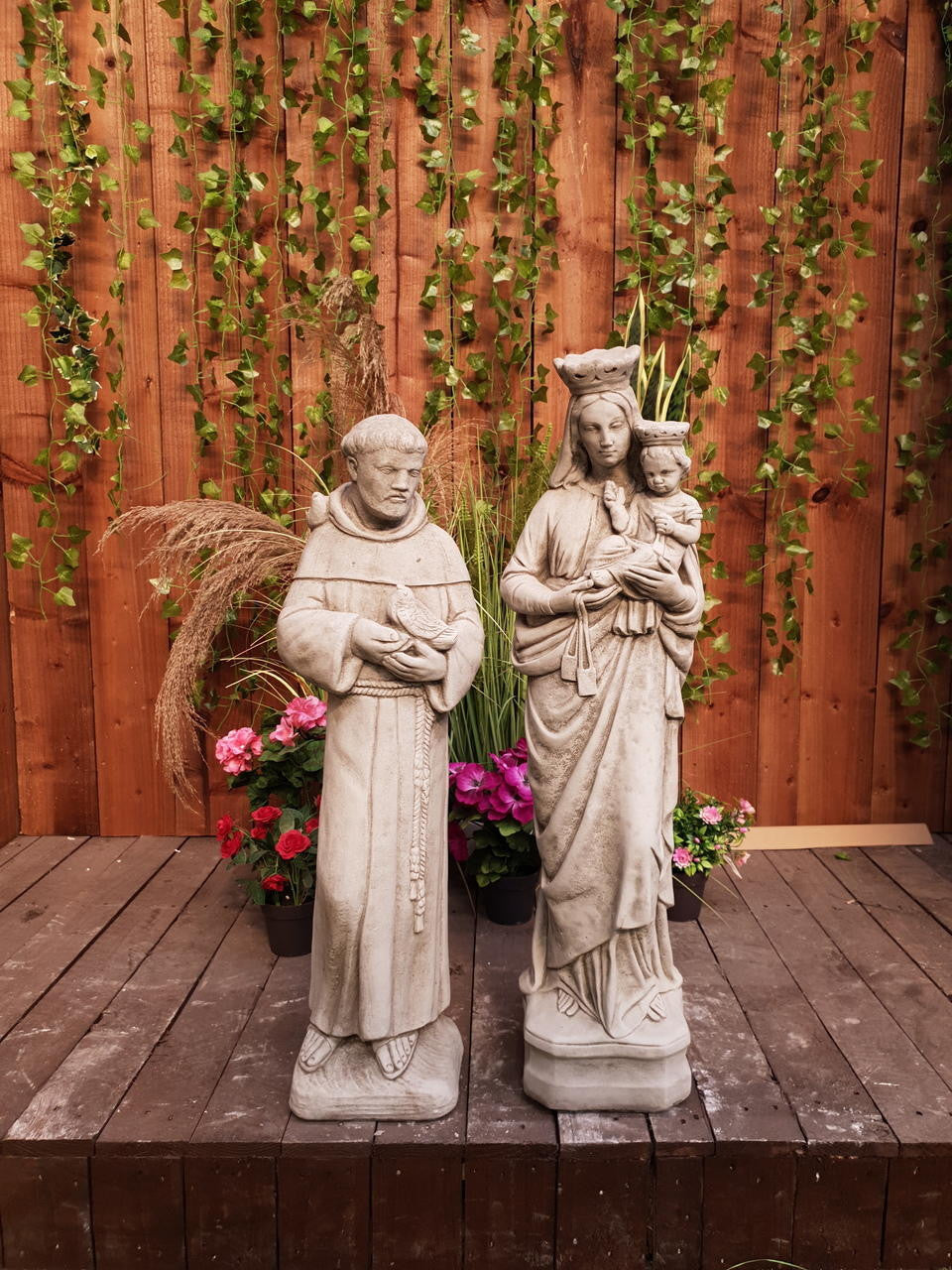 Stone Cast statues of Mary with Child and St Francis