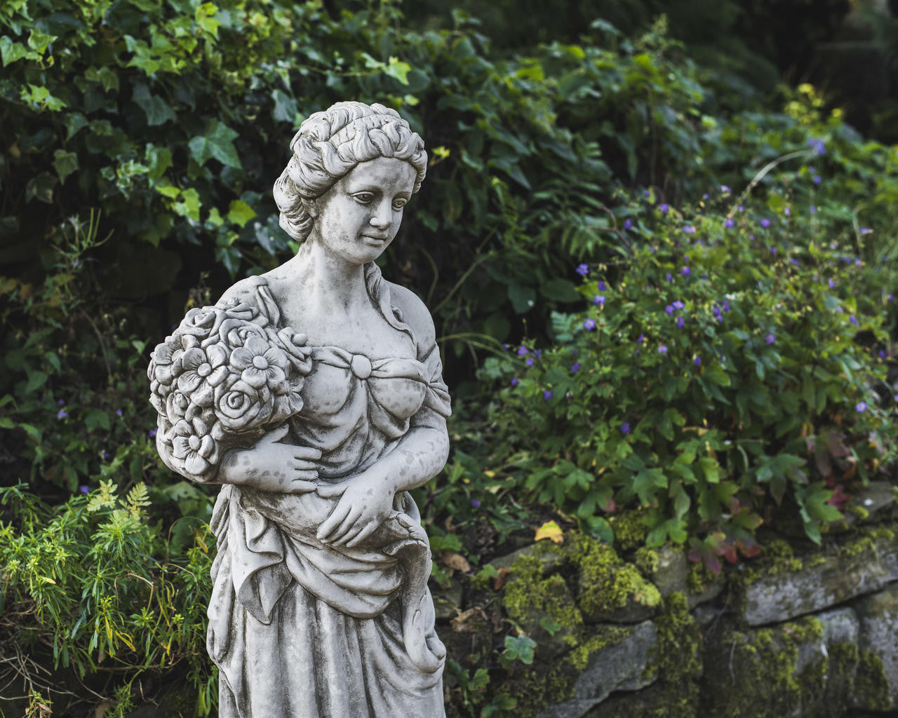 Tall Stone Cast Lady with Flowers