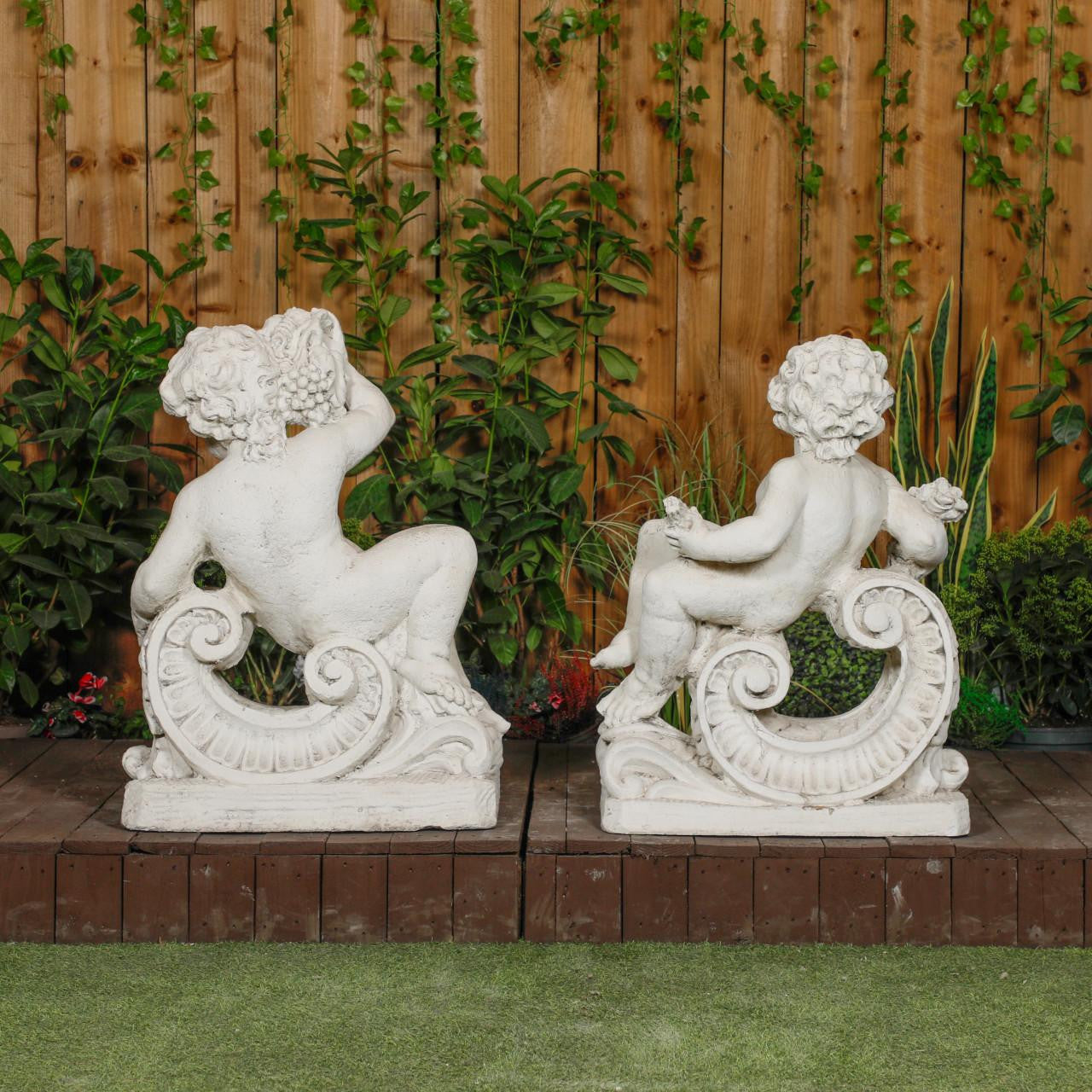 Very Large Pair of Cherub Statues with Fancy Columns 
